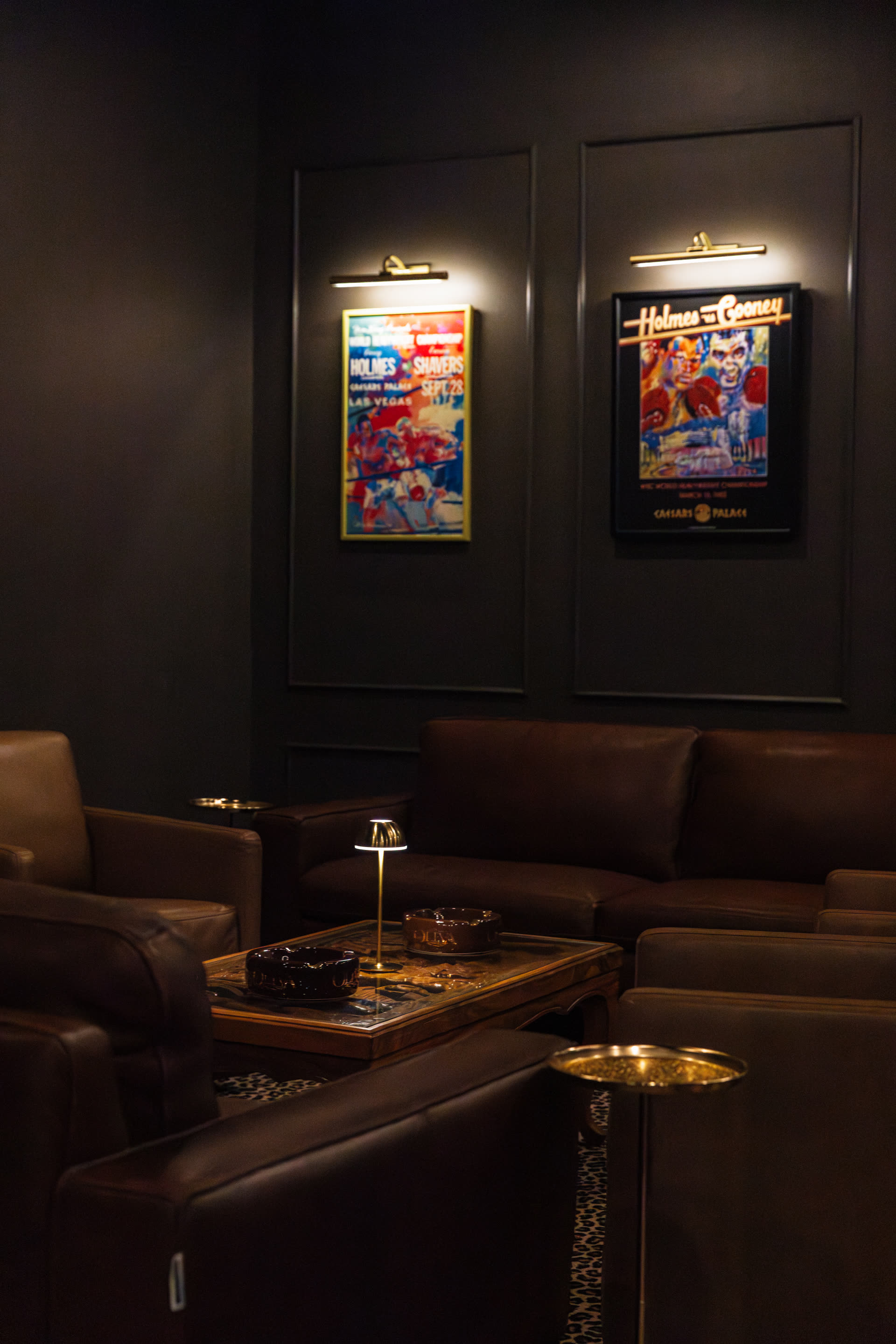 Framed photographs and posters inside Legends